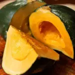 Delicious Thai custard baked in a pumpkin for a unique dessert experience
